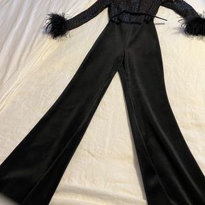 Ladies dressy jumpsuit! This is fun and a beautiful piece to add to your closet!